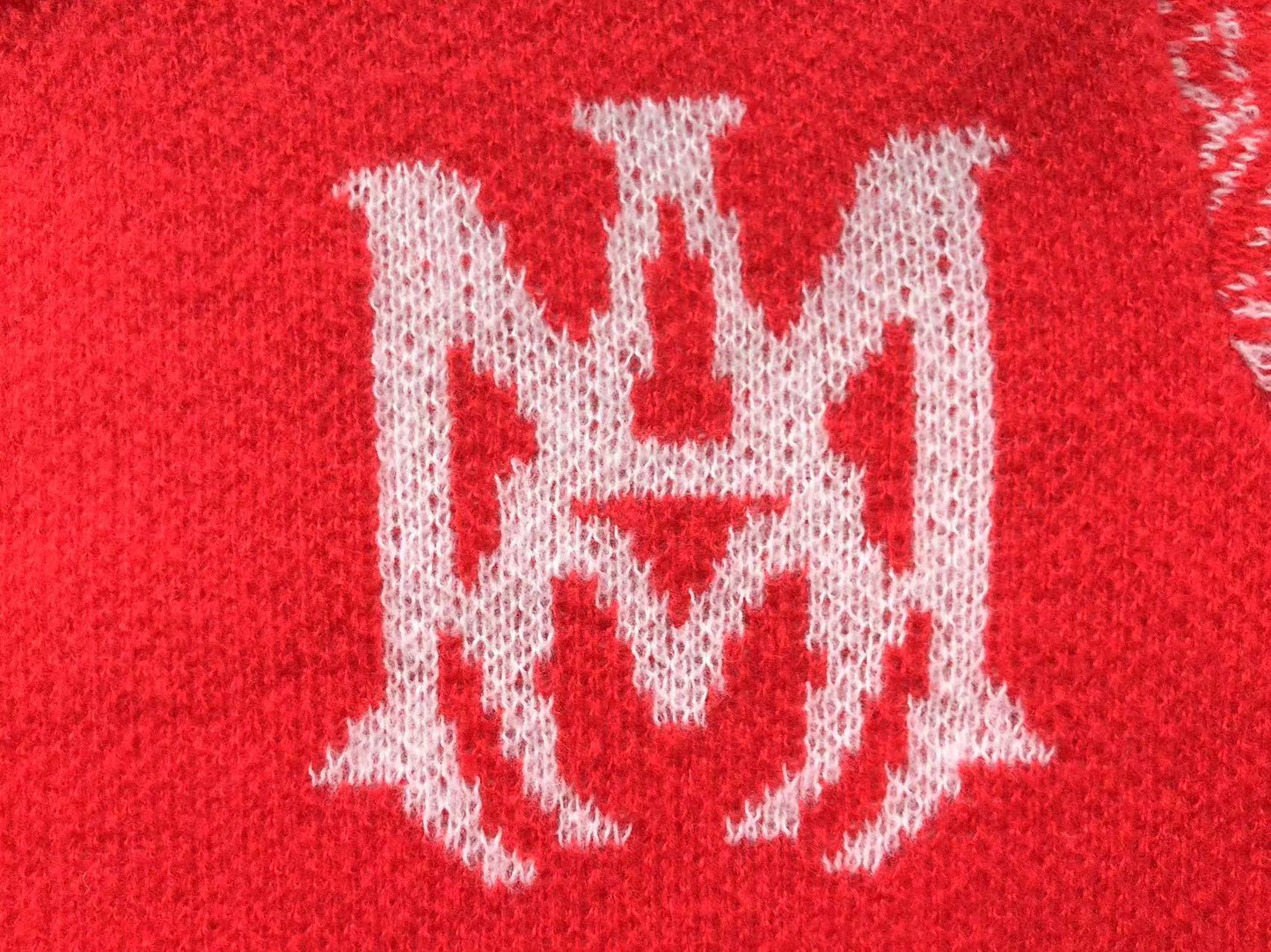 MAGLIONE AMIRI