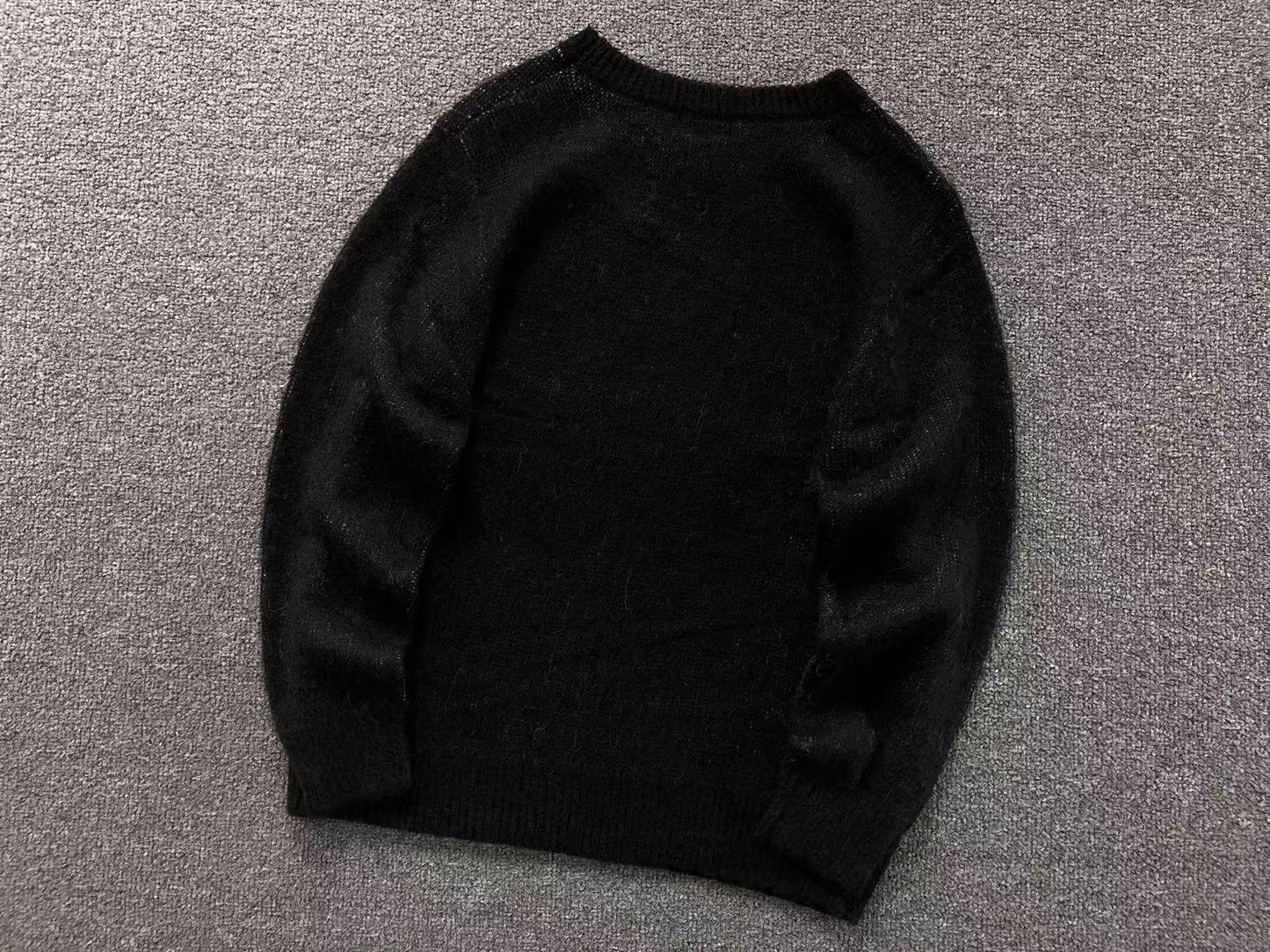 MAGLIONE AMIRI