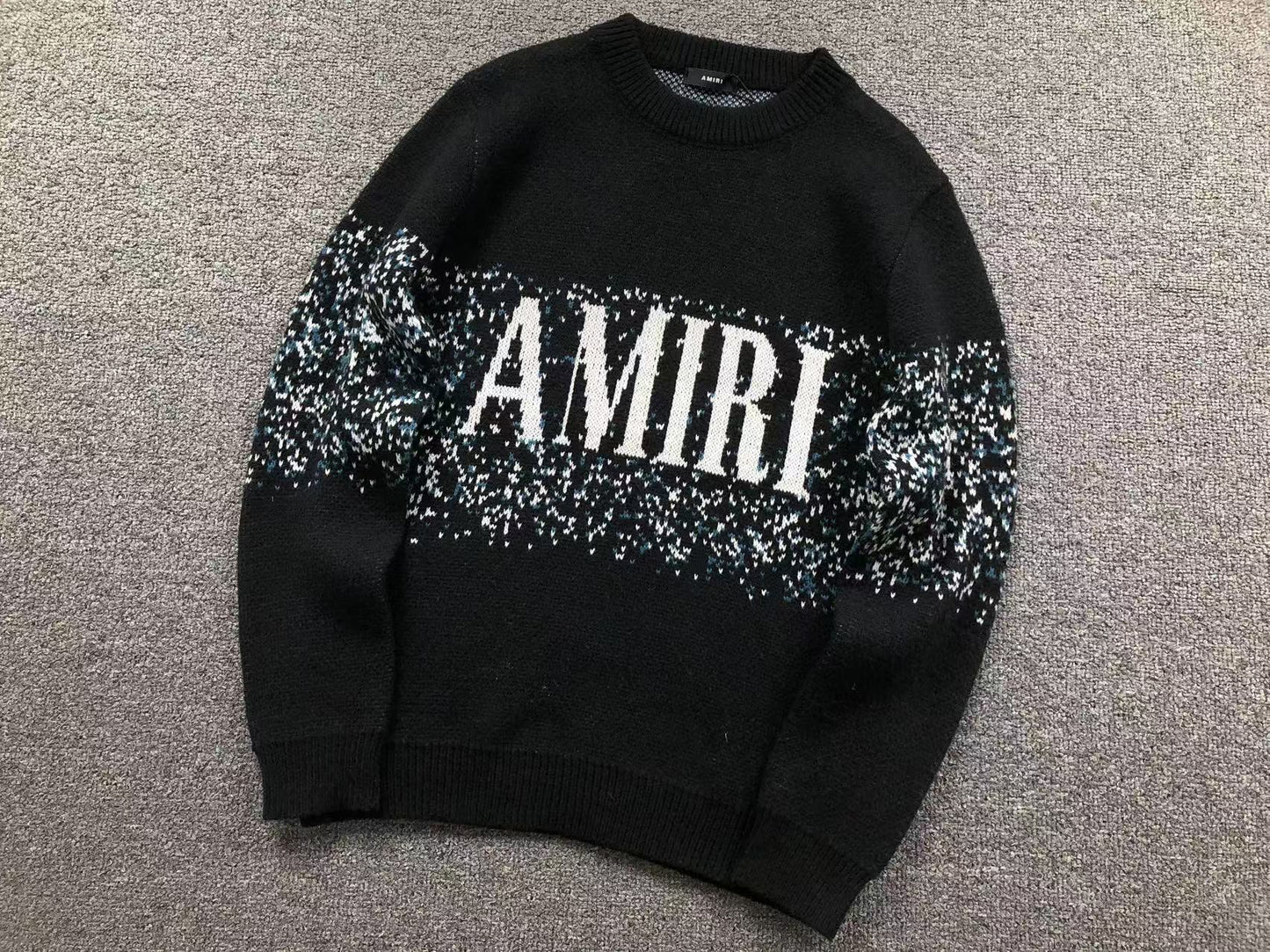 MAGLIONE AMIRI