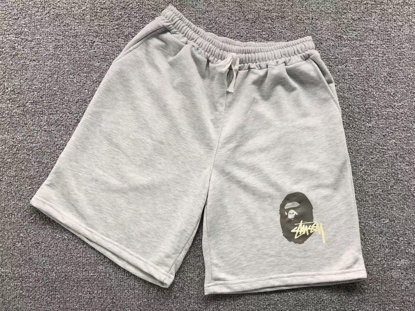 PANTALONCINI BAPE x STUSSY