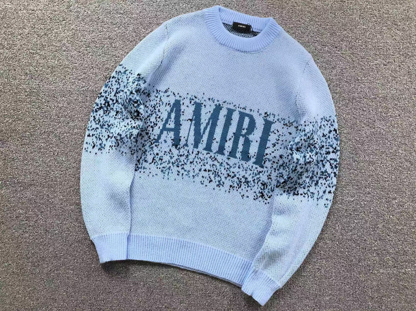 MAGLIONE AMIRI