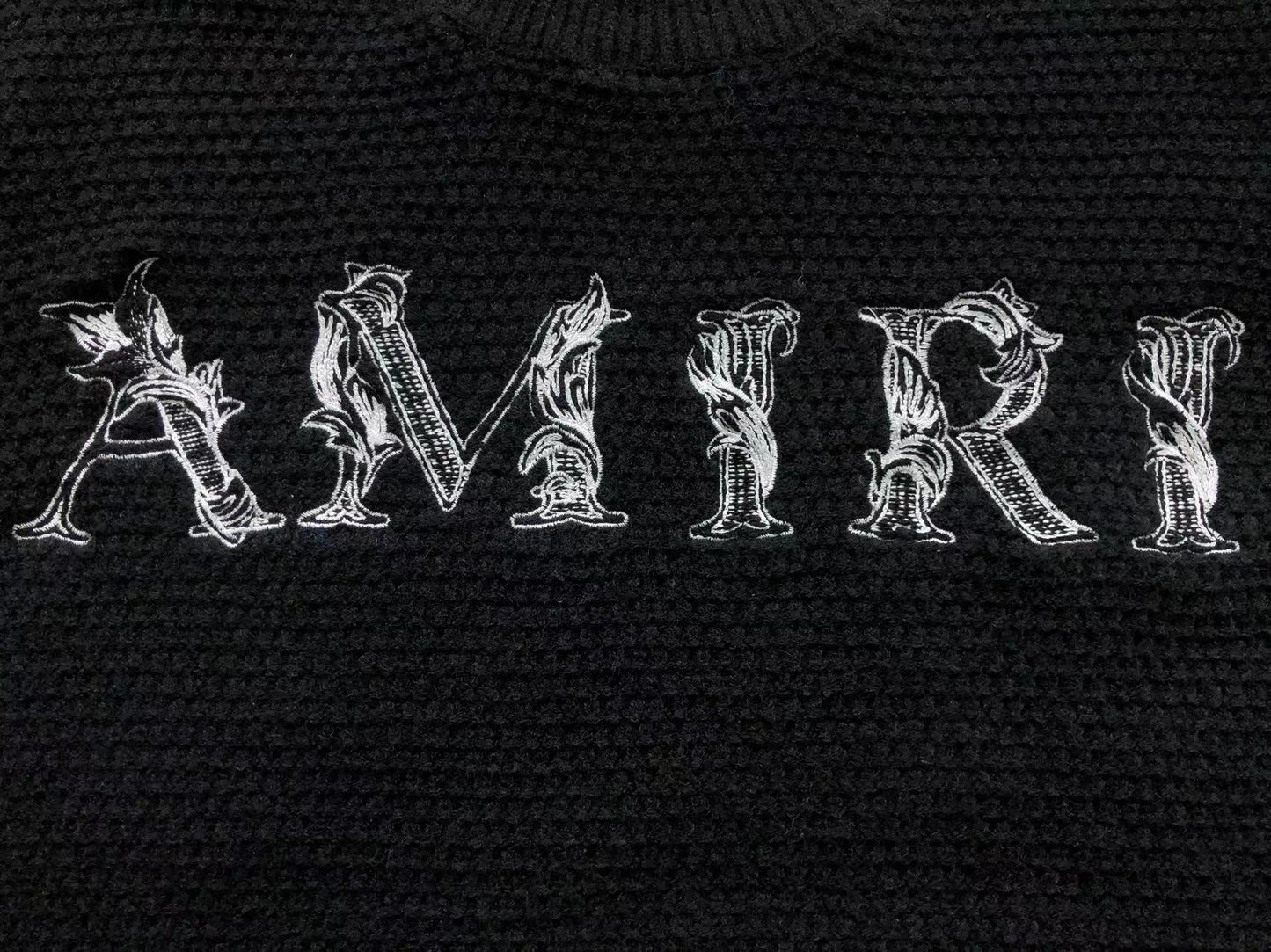 MAGLIONE AMIRI