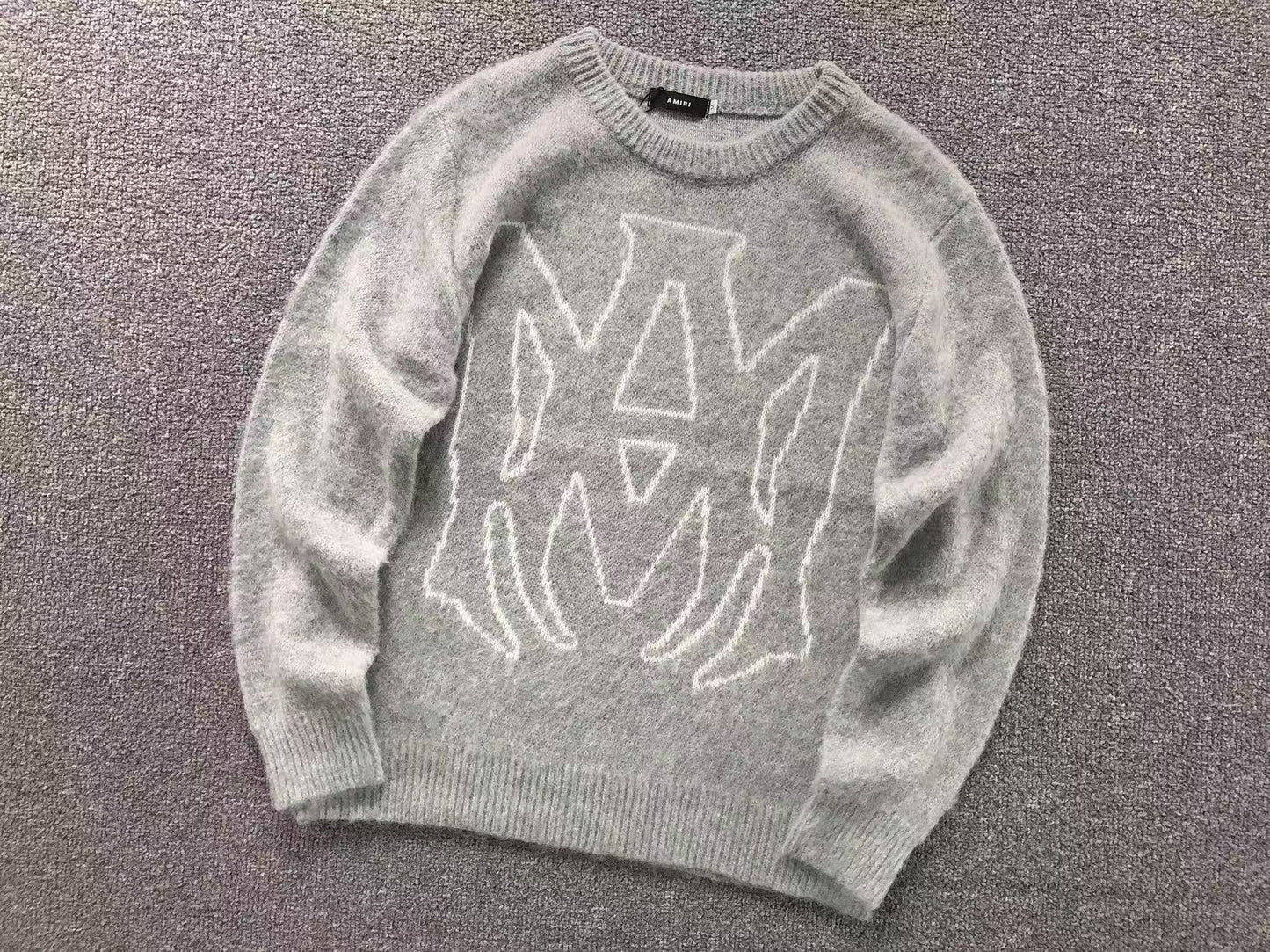 MAGLIONE AMIRI
