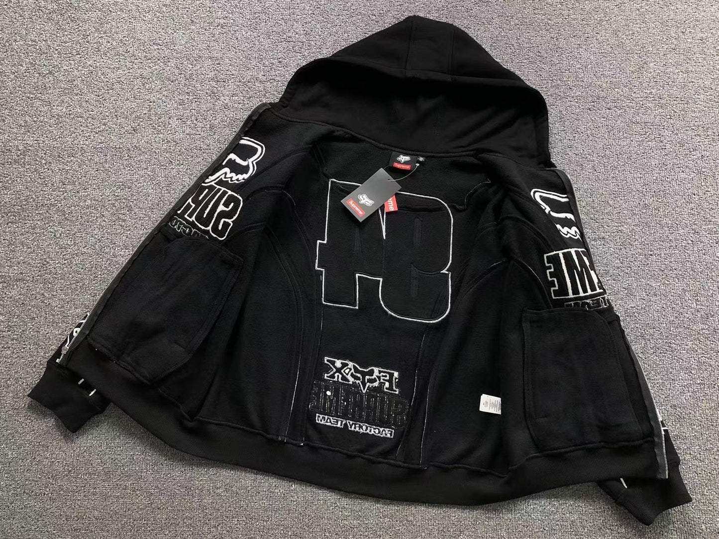 FELPA SUPREME ZIP HOODIE